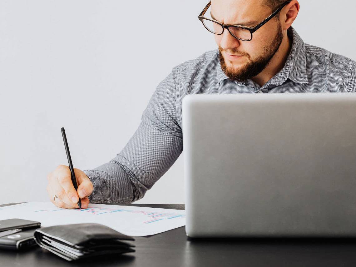 Man writing with pen